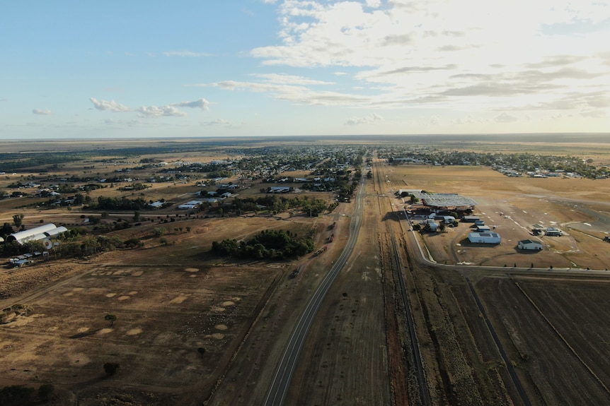 Drone shot of road into Longreach. 