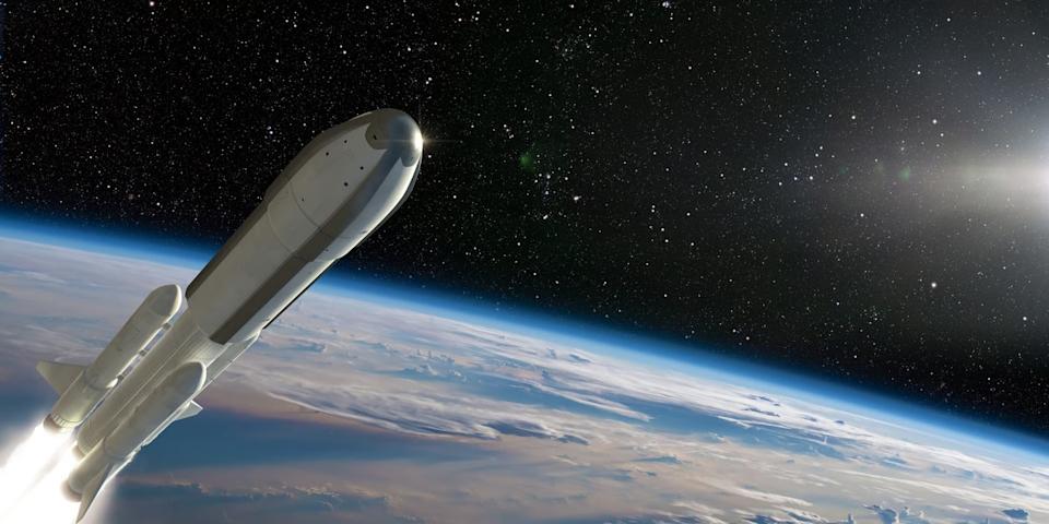 A rocket launch above Earth. 