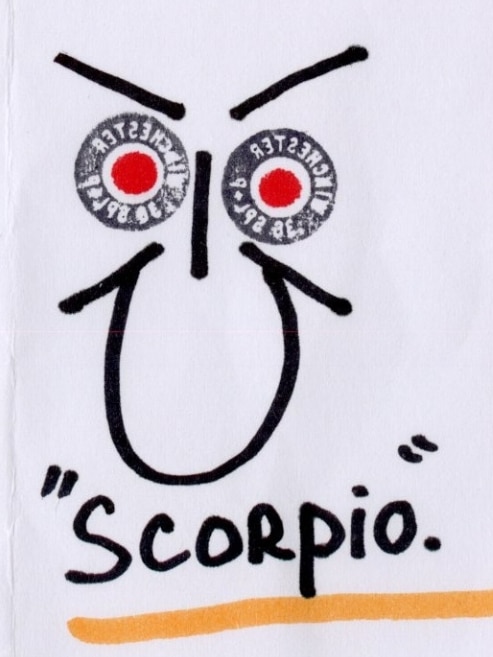 The outline of a scary face in black texta with two eyes stamped on with red circles in the middle with 'Scorpio' underneath.
