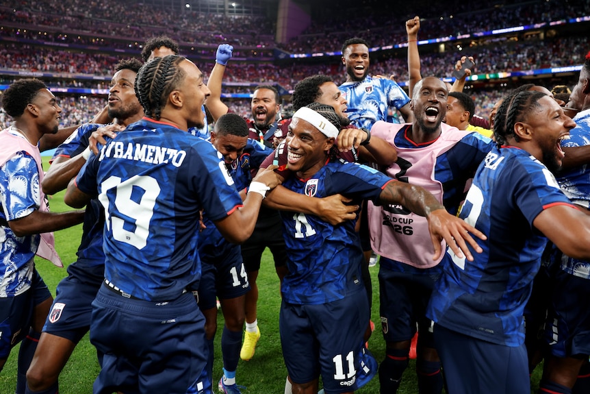 Players celebrate with each other.