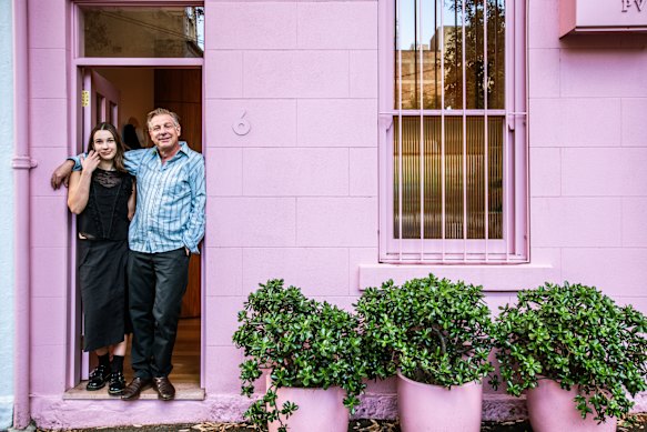 Architect Nick Bell with daughter Charlie at the re-imagined Surry Hills property.
