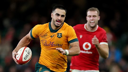 Tom Wright racing away for the Wallabies in Wales.