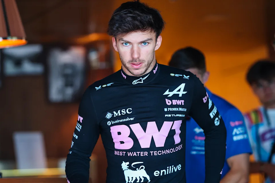 Pierre Gasly walks in the paddock.
