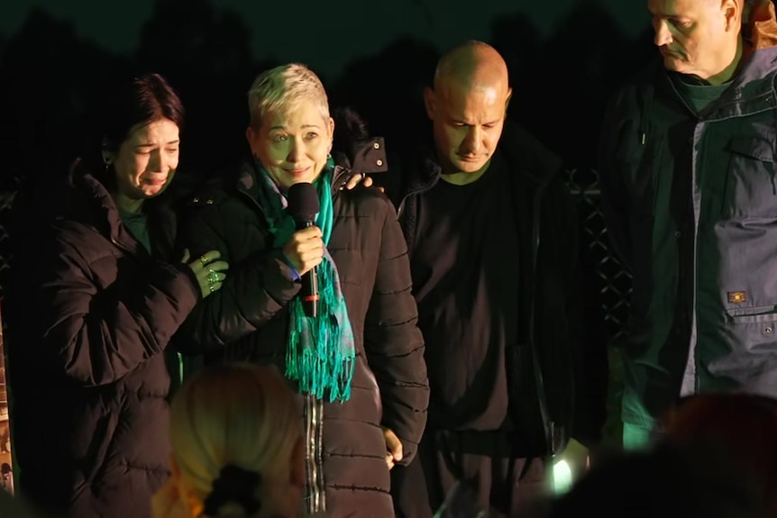 Aidan Becker's family address the crowd