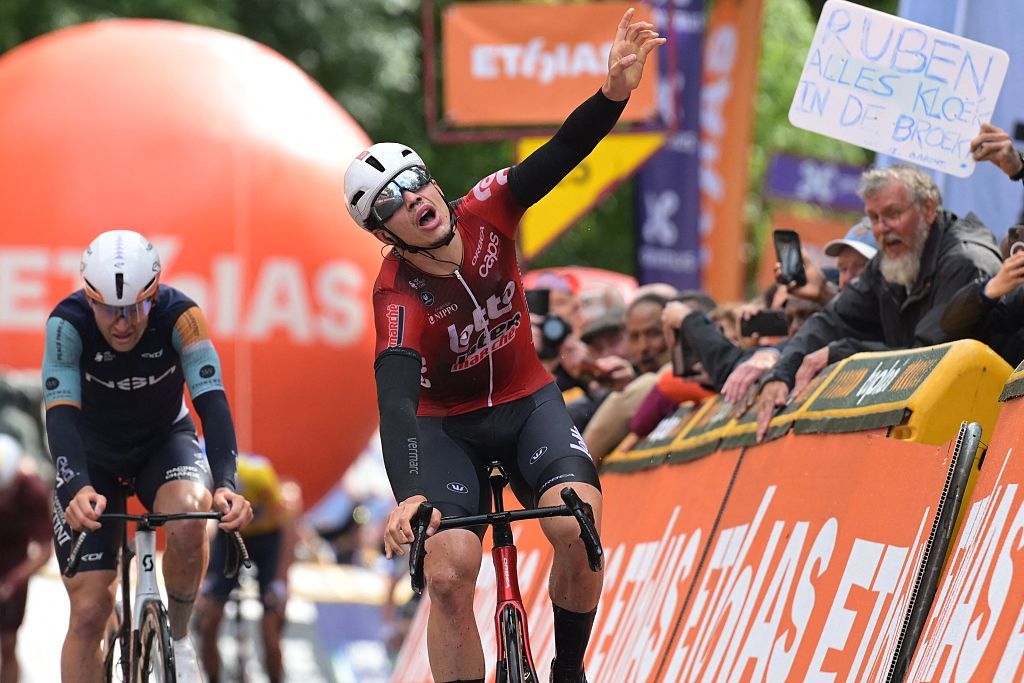Belgian Arnaud De Lie of Lotto-Intermarche celebrates as he crosses the finish line to win the fourth stage of the Tour De Wallonie