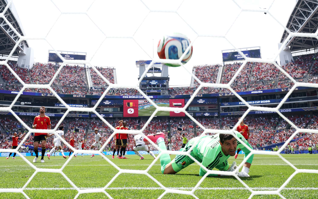SEATTLE, WASHINGTON - JUNE 15: (EDITOR'S NOTE: Image was captured using a remote camera positioned above the field of play.) Thibaut Courtois #1 of Belgium concedes a first goal to Emam Ashour #8 (not pictured) of Egypt during the FIFA World Cup 2026 Group G match between Belgium and Egypt at Seattle Stadium on June 15, 2026 in Seattle, Washington. (Photo by Alex Grimm/Getty Images)