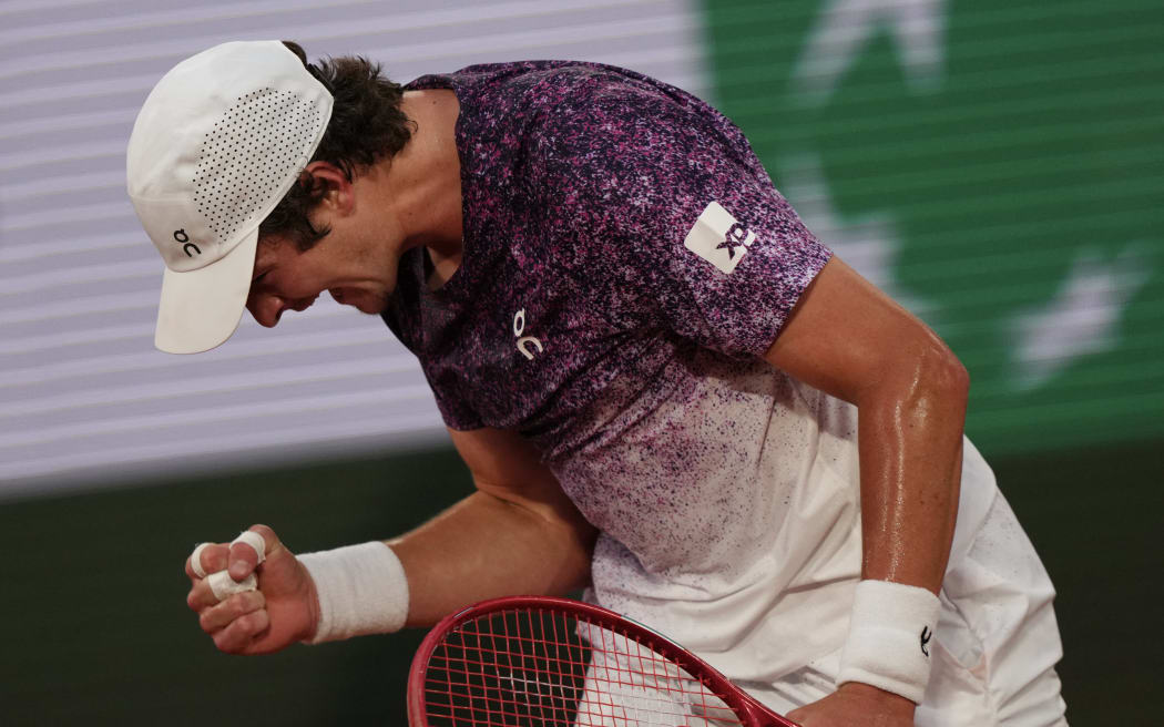Brazil's Joao Fonseca reacts to a point against Norway's Casper Ruud during their men's singles match on day 8 of the French Open tennis tournament on Court Philippe-Chatrier at the Roland-Garros Complex in Paris on May 31, 2026. (Photo by Dimitar DILKOFF / AFP)