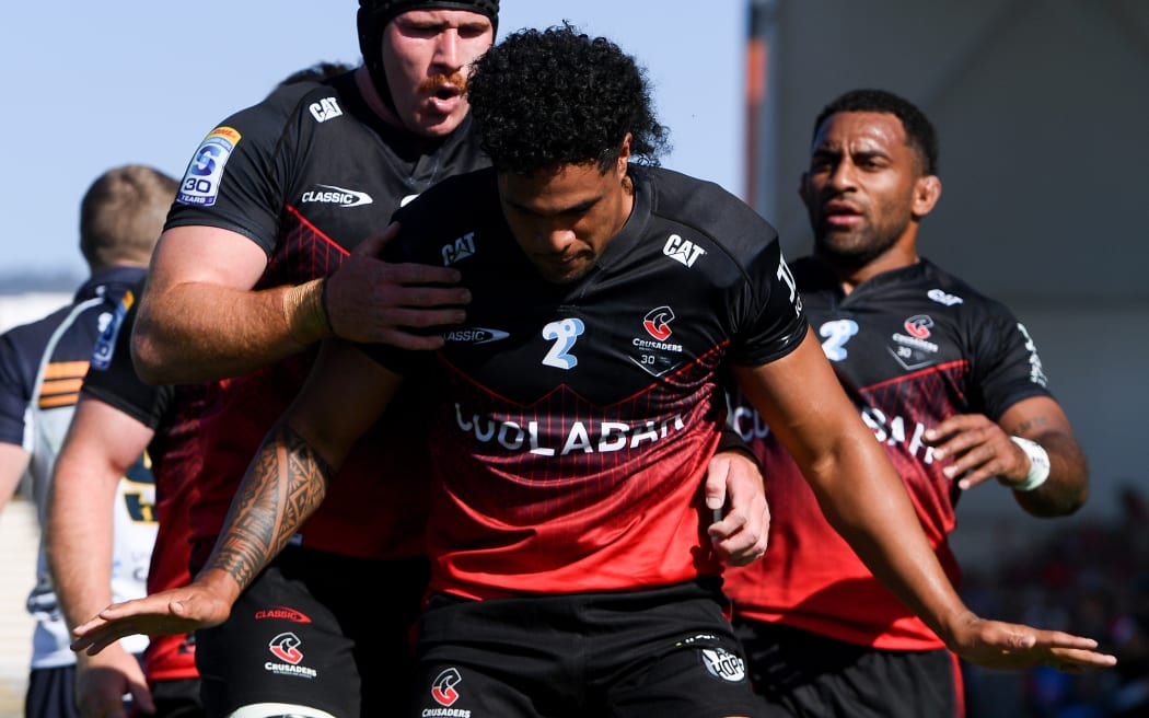 Leicester Fainga'anuku of the Crusaders celebrates his try.