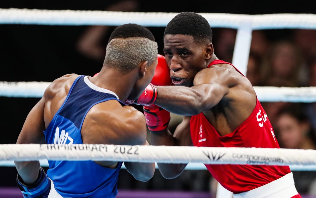 Wendell Stanley of New Zealand in red and Tiago Osorio Muxanga of Mozambique in blue during their quarter-final at the 2022 Birmingham Commonwealth Games.