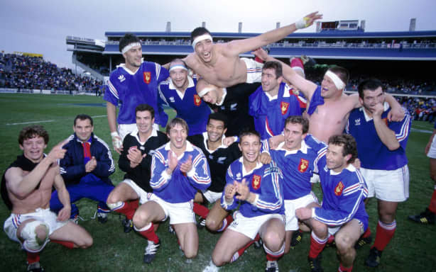 French players celebrate after beating the All Blacks 23-20 at Eden Park, in 1994.