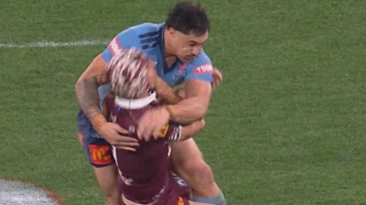 Kalyn Ponga was flattened by Kotoni Staggs. Image: Nine