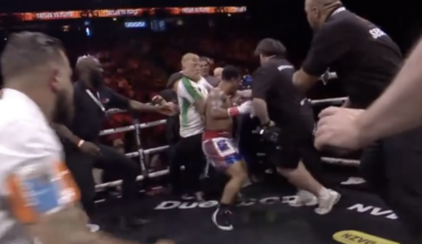 Anthony Taylor rushes at Matty Floyd