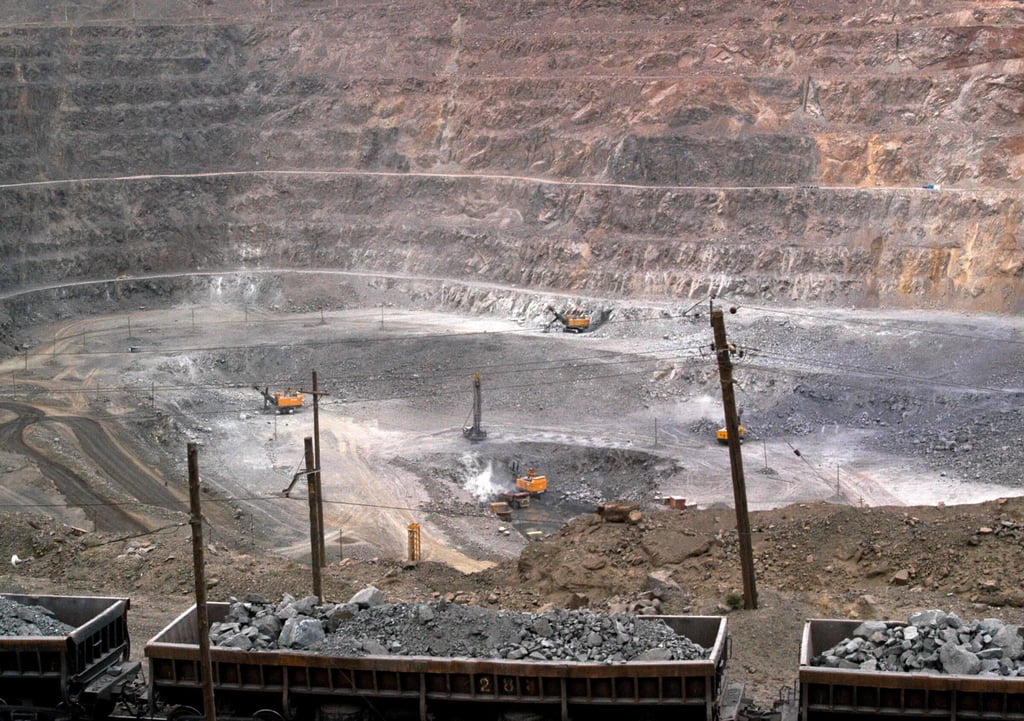 Workers use heavy machinery to dig for rare earths at a mine in northern China’s Inner Mongolia autonomous region. Photo: AP