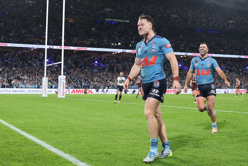 Ethan Strange celebrates a try in State of Origin I.