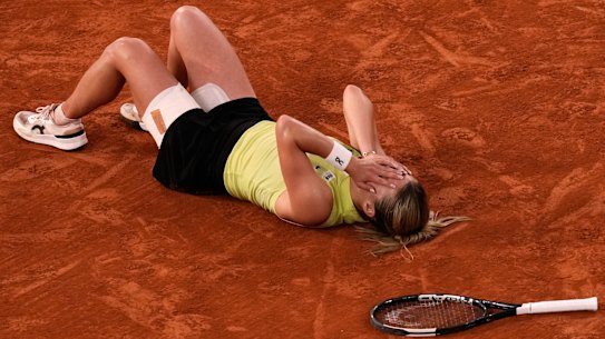 Maja Chwalinska of Poland celebrates winning match point.