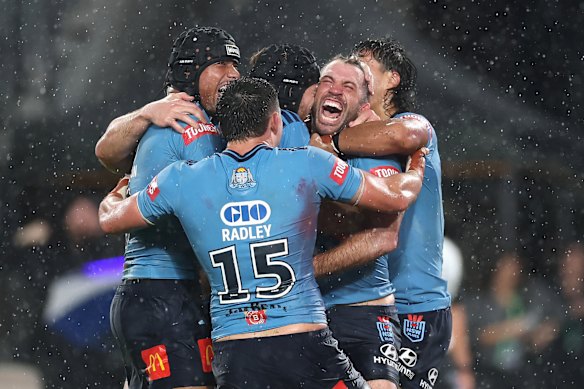 James Tedesco celebrates his match-winning try for the Blues in Origin 1 last month. 