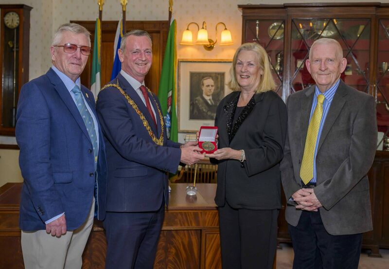 Cork Boxing: Lord Mayor of Cork Fergal Dennehy makes a presentation to Fionnuala Mac Curtain on behalf of the Cork County Boxing Board with former president Dan O'Connell and current president Mick O'Brien.