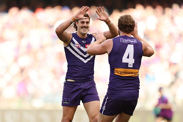 Luke Jackson of the Dockers celebrates a goal during the round 16 AFL match between Fremantle Dockers and Gold Coast Suns at Optus Stadium.