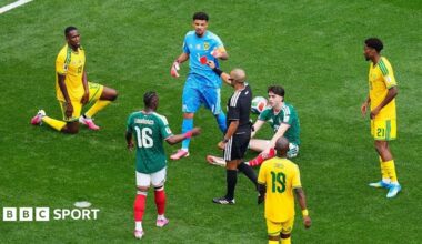 Brian Gutierrez of Mexico is fouled by Sphephelo Sithole of South Africa. Sithole was issued a red card.