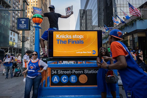 The 34th Street subway station has been decked out in Knicks colours, as have many New York City skyscrapers.