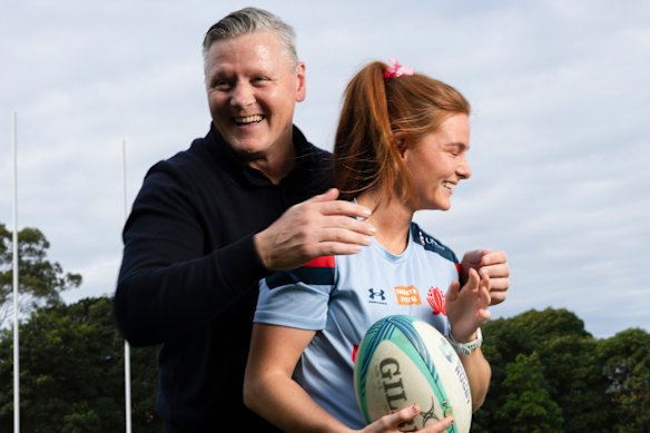 Matt and Edie Burke shared a laugh ahead of Edie’s run-on debut for the Tahs.