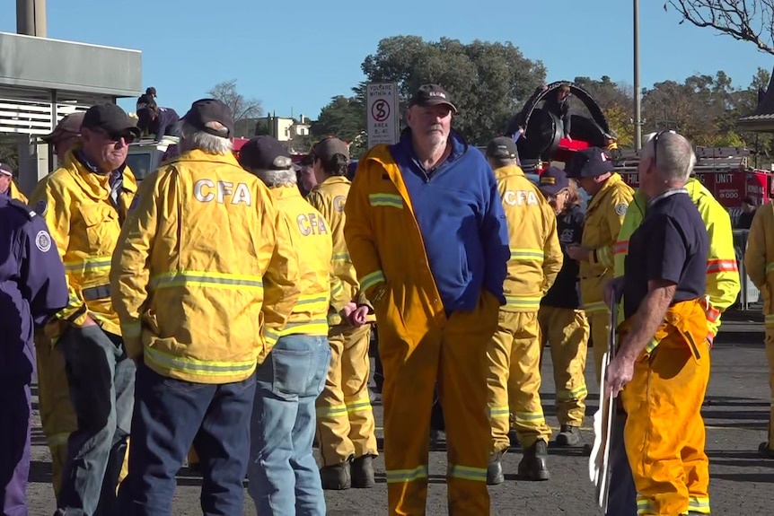A group of people wearing yellow CFA jackets.