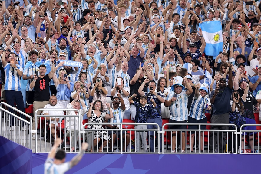 Lionel Messi salutes the crowd