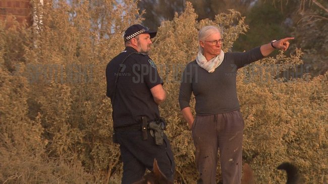 Josie Murray talking to police during the search for Gus Lamont