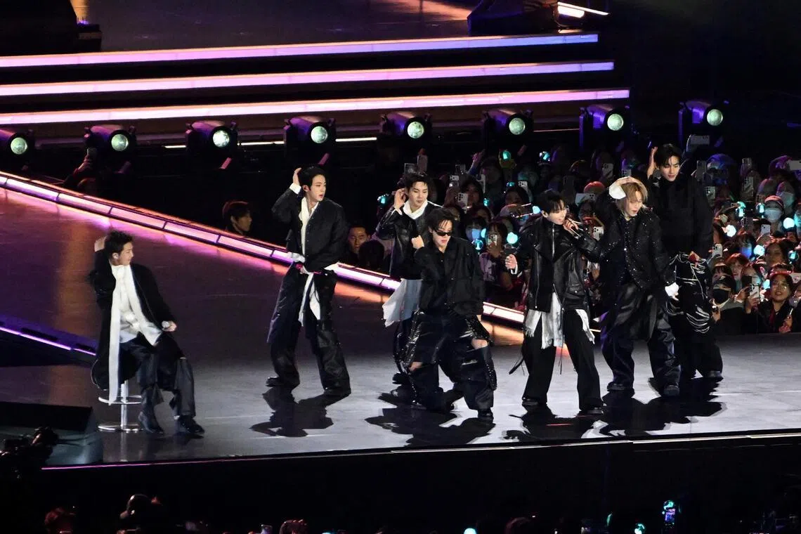 K-pop boy band BTS performing onstage during a comeback concert at Gwanghwamun Square in Seoul on March 21.