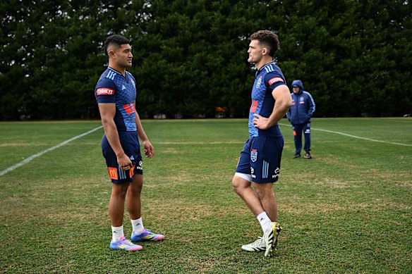 Isaiya Katoa rubs shoulders with Nathan Cleary at NSW training in 2025.