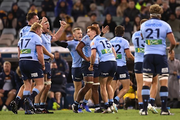 The Waratahs celebrate a great win in Canberra earlier this year.