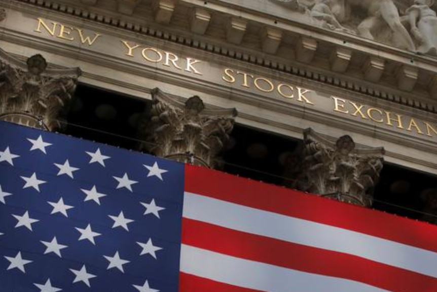 A US flag flies outside the New York Stock Exchange.