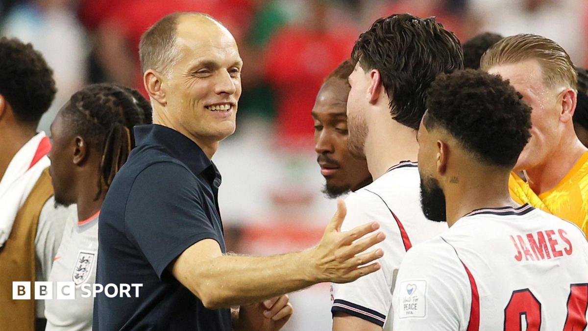 Thomas Tuchel is surrounded by cameramen