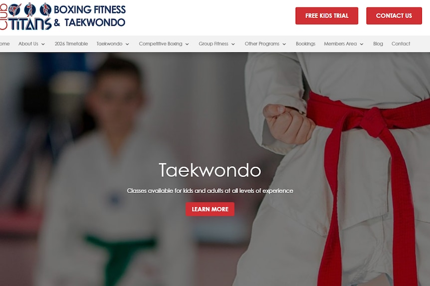 A screenshot of a website. The title says Club Titans. The image is of three unidentified children in Taekwondoe uniforms