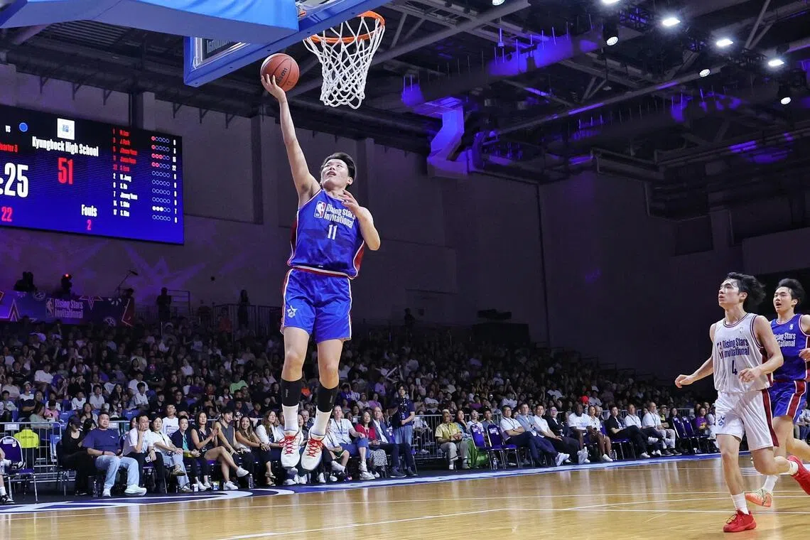 Yoon Ji-won of Kyungbock High School scoring a layup against Tottori Johoku High School in the NBA Rising Stars Invitational boys’ division final at OCBC Arena on June 28, 2026.