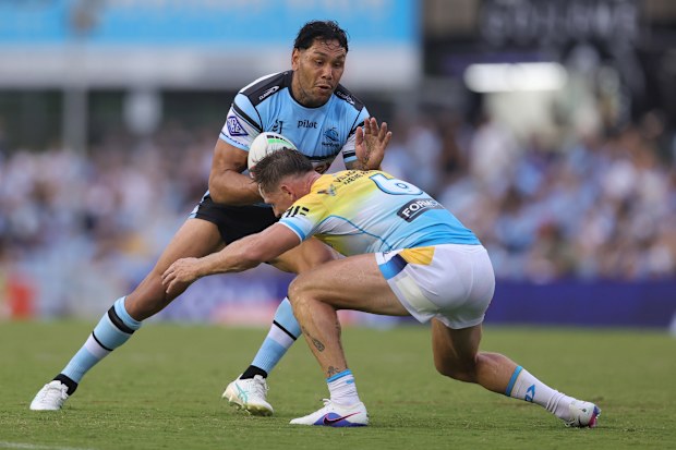 SYDNEY, AUSTRALIA - MARCH 07: Jesse Ramien of the Sharks is tackled during the round one NRL match between Cronulla Sharks and Gold Coast Titans at Ocean Protect Stadium on March 07, 2026 in Sydney, Australia. (Photo by Jason McCawley/Getty Images)