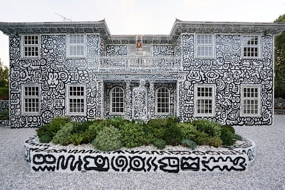 Everything in Sam Cox’s house – from kitchen utensils to his Tesla – has been covered in doodles.