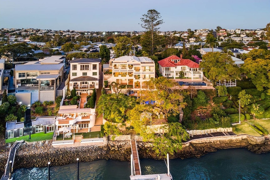 Birds eye view of four riverside mansions in Hawthorne, Brisbane