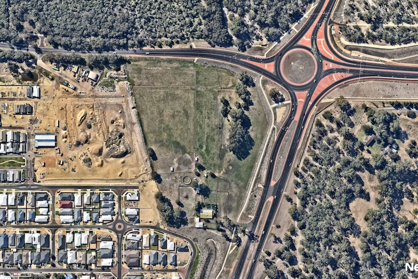 An aerial photo of a block of vacant land