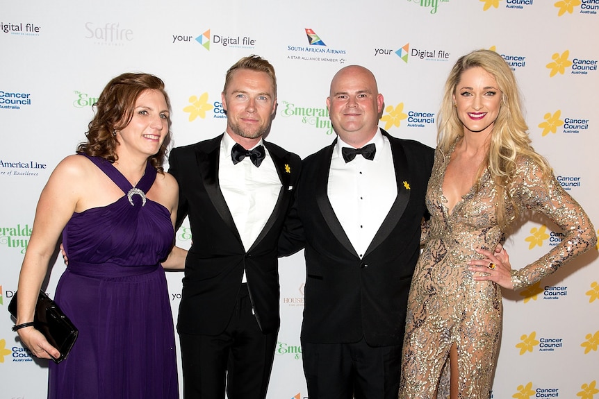 Ronan Keating poses with Jamie Wilson and two women.