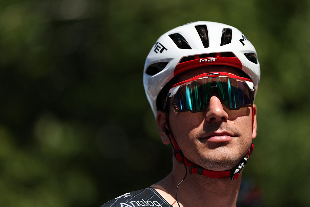 Joao Almeida awaits the start of the 2nd stage of the Tour Auvergne-Rhone-Alpes
