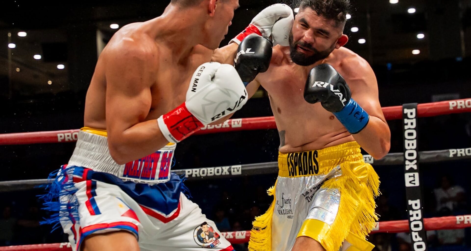 Weljon Mindoro lands a punch to his opponent Elias Espadas.