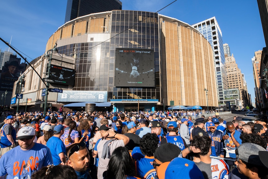 A crowd of people outside the Madison Square Garden venue.
