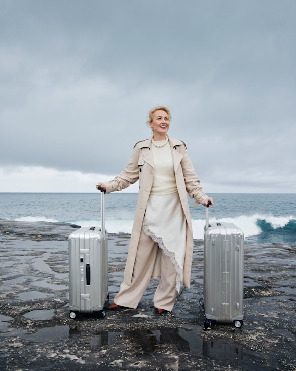 Witchery trench coat, slip dress and
knit T-shirt. Bianca Spender trousers. Dinosaur Designs jewellery. Bared shoes. Samsonite suitcases
from Strandbags.