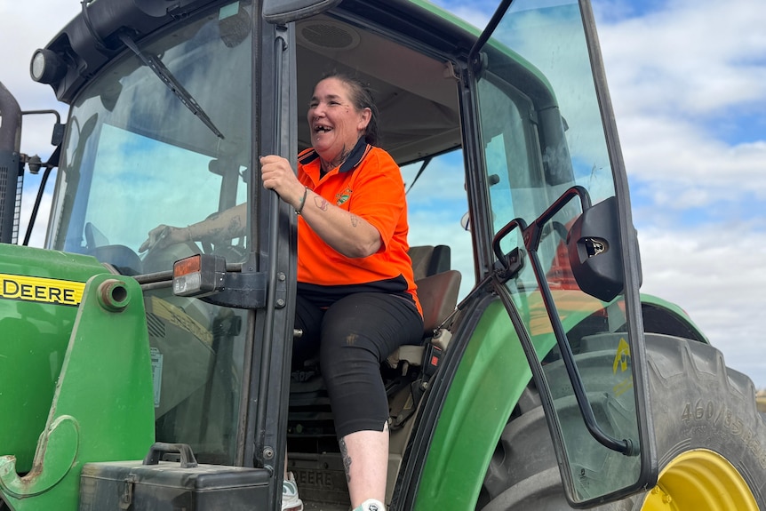 a lady in the tractor cab