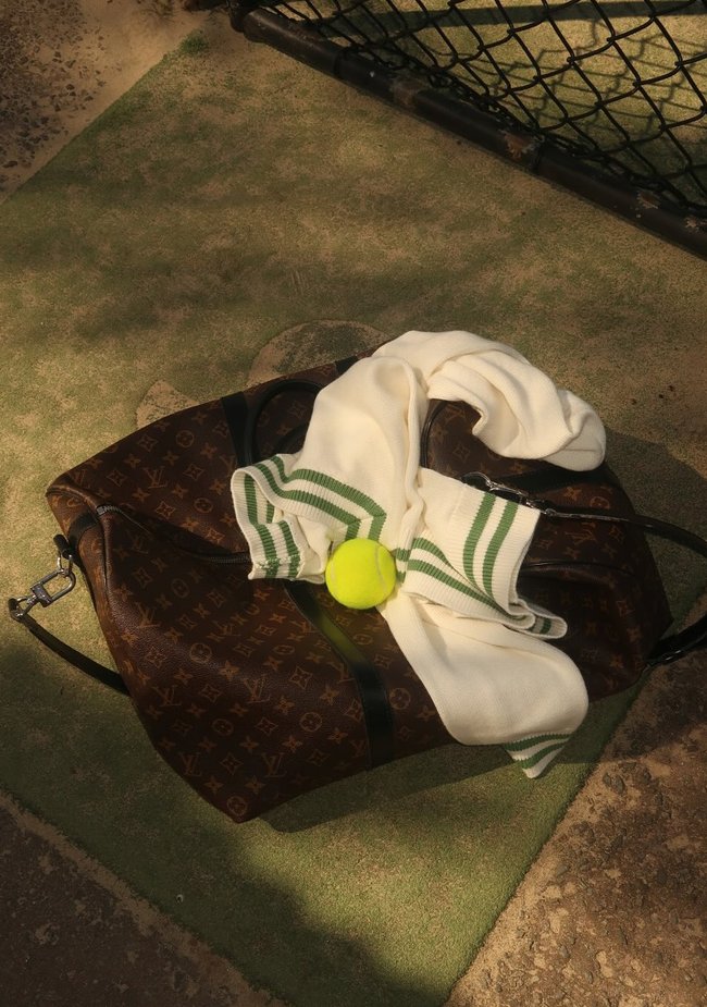 I’ve got my eye on the Off Court V-Neck Jumper (down to $153.30), which looks great thrown over the tennis outfit.
