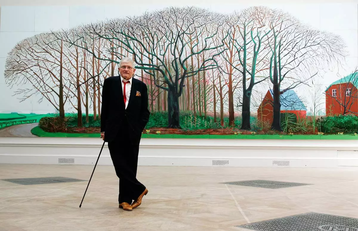 FILE - British artist David Hockney poses as he unveils his painting 'Bigger Trees Near Water', the largest painting ever shown at the Royal Academy's Summer Exhibition, London, Friday, May 25, 2007. (AP Photo/Sang Tan, File)
