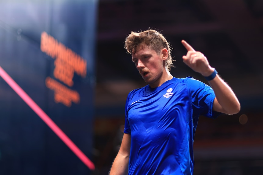 Greg Lobban holds up his finger