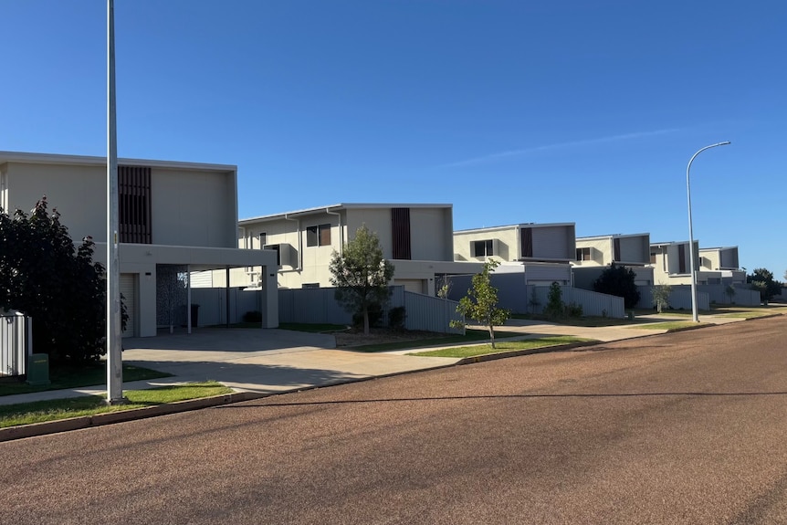 Modern homes line a street in the outback town of Quilpie