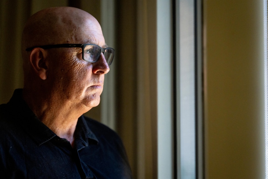 A man wearing glasses